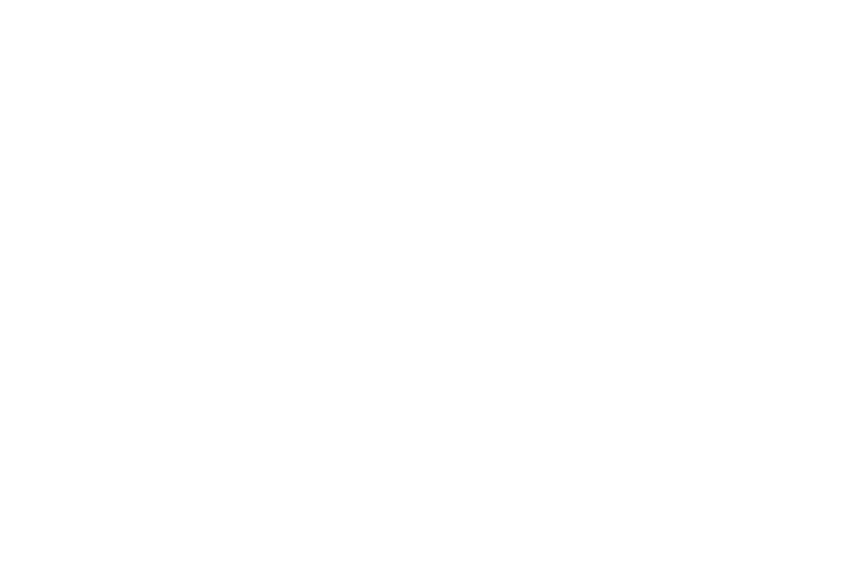 Line drawing of an operator at a multi-monitor control console